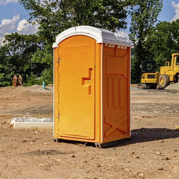 how often are the porta potties cleaned and serviced during a rental period in Aurora Center